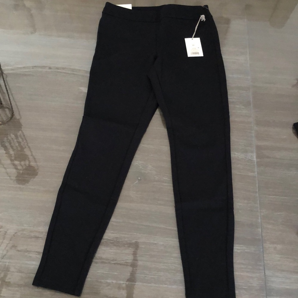 a new day black skinny high rise tight.With original tag